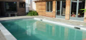 Pool surrounds natural stone