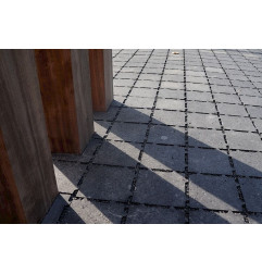 Draining concrete paver - permeable to water